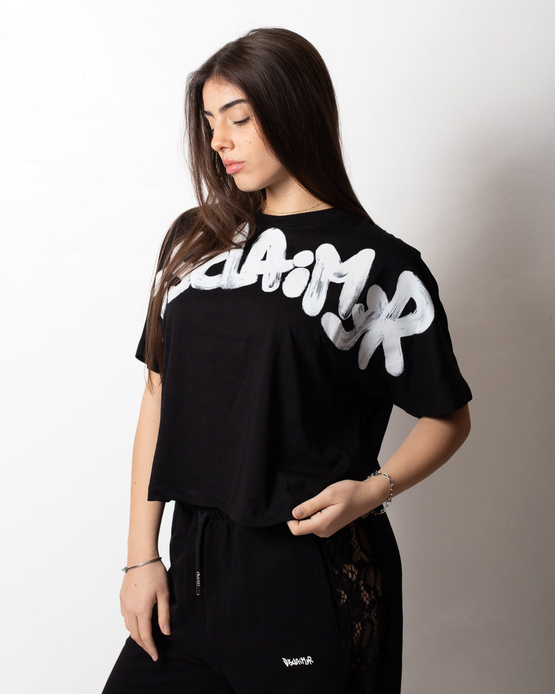 T-Shirt Disclaimer cropped con logo glitter donna