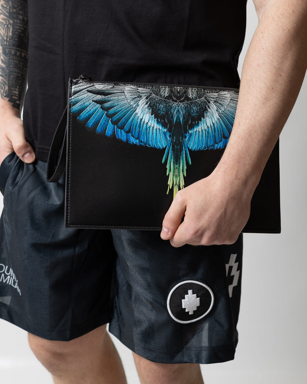 Pochette Marcelo Burlon in ecopelle "Icon Wings Royal" logato