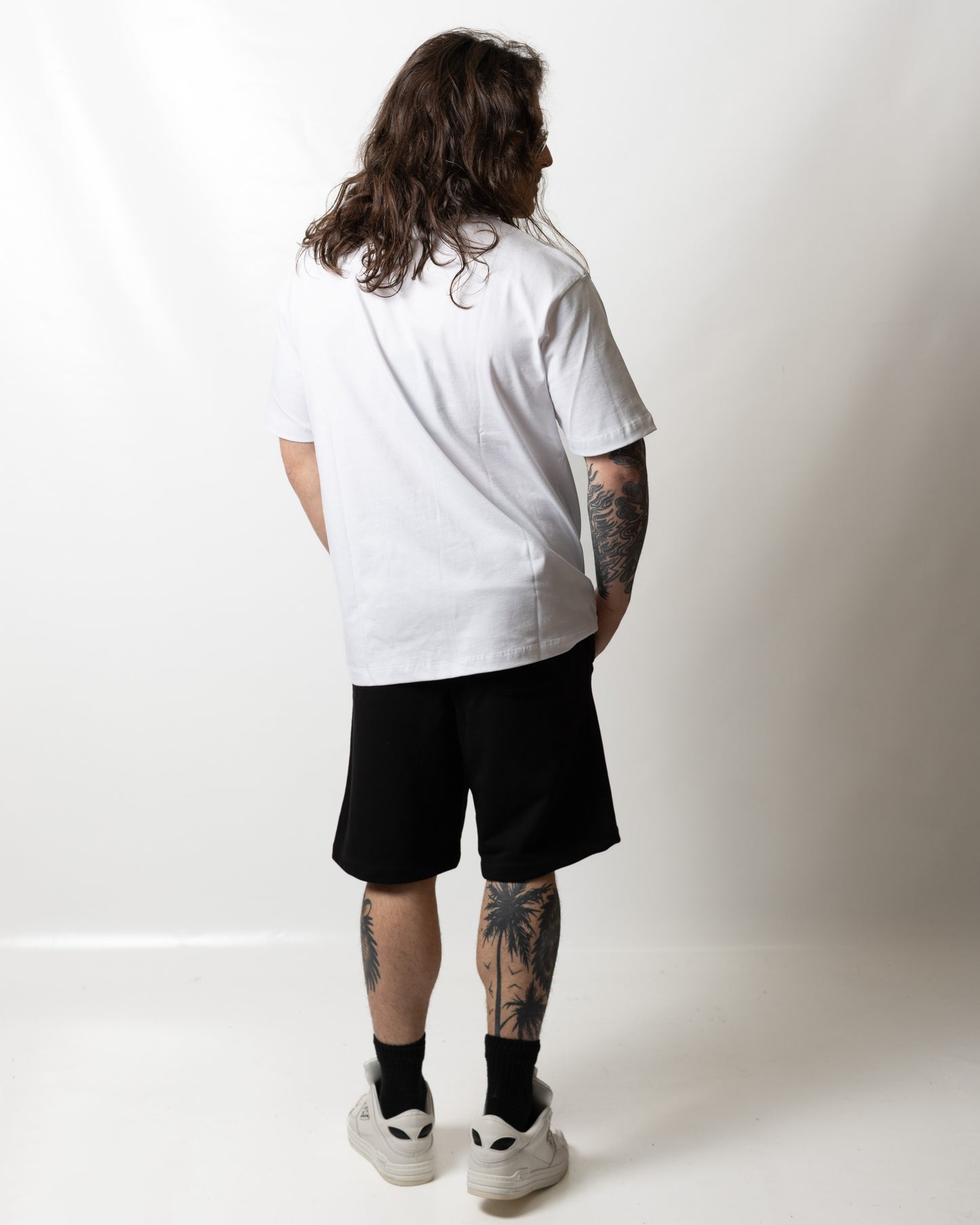 T-Shirt Comme des Fuckdown con borchie multicolor uomo