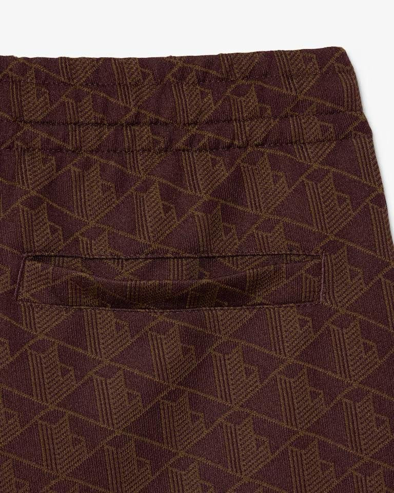 Pantalone Lacoste logato allover uomo