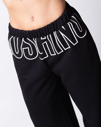 Pantalone Moschino Active con grafica logo in rilievo a contrasto