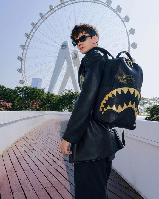 Zaino Sprayground nero Shark central gold dlxsv backpack