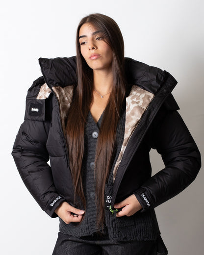 Piumino Disclaimer puffer con dettagli maculati donna