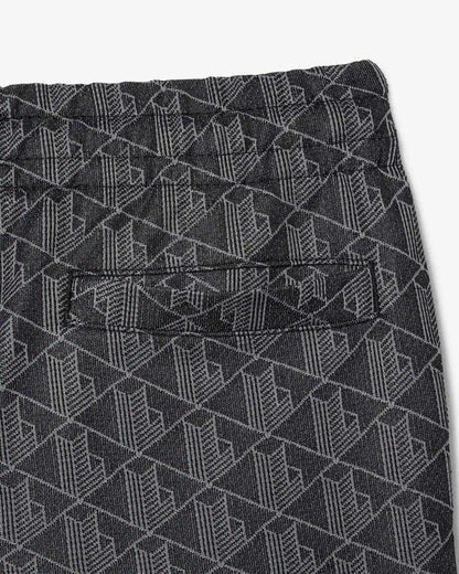 Pantalone Lacoste logato allover uomo