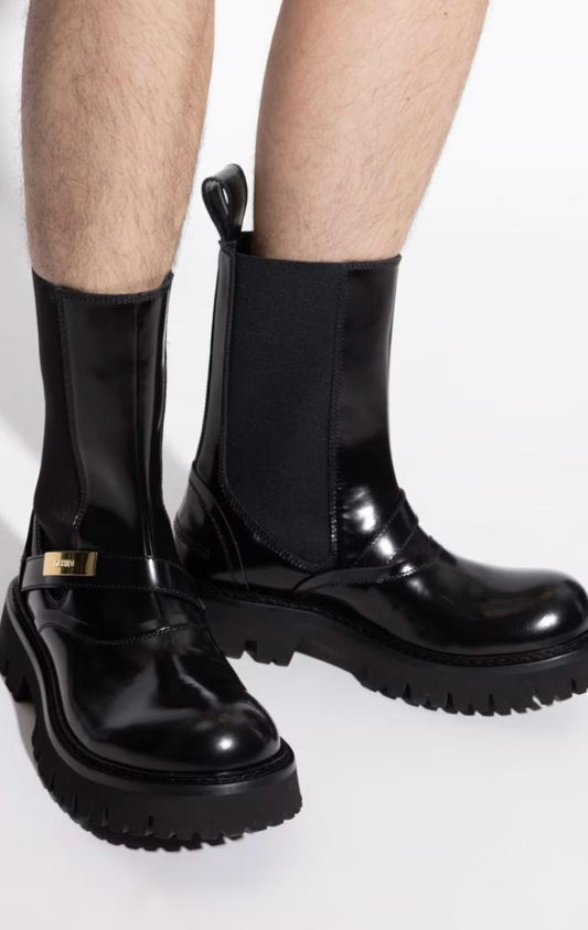 Stivali Moschino slip-on in pelle con placchetta logata uomo