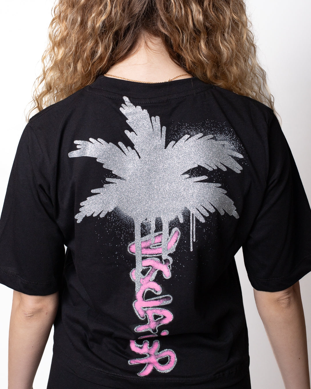 T-Shirt Disclaimer cropped con stampa e logo glitter donna