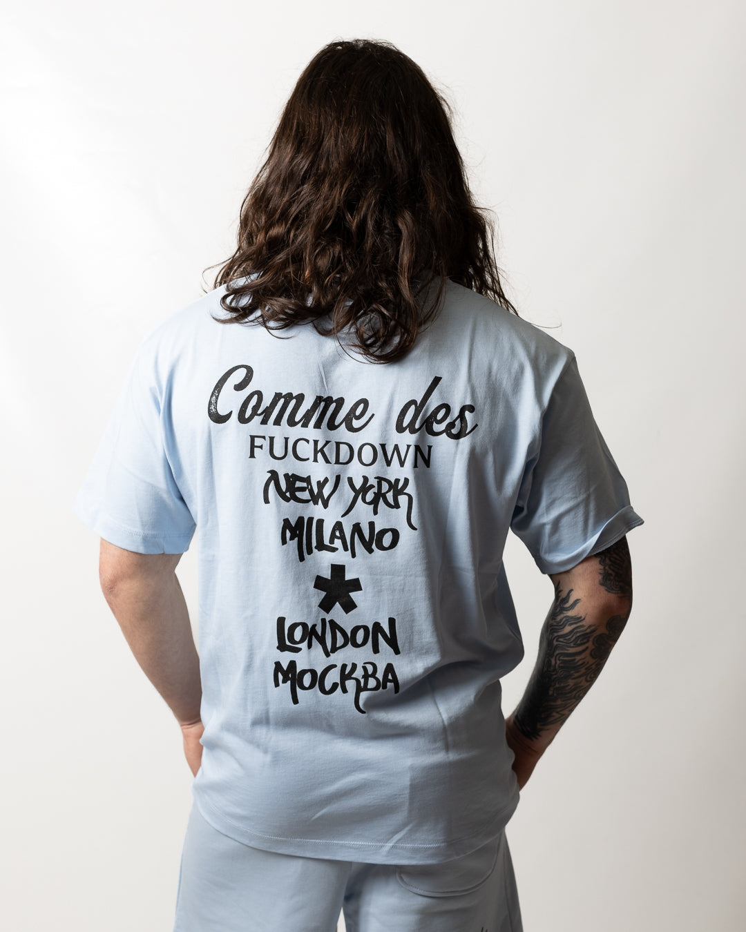 T-Shirt Comme des Fuckdown con stampa signature uomo