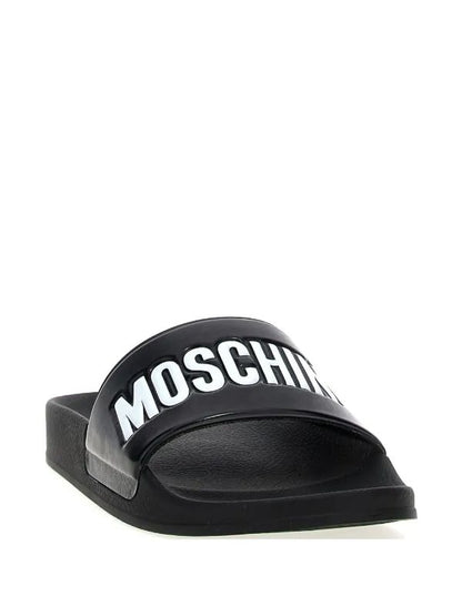 Ciabatta Moschino in gomma con logo iconic uomo
