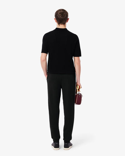 Pantalone Lacoste con logo firmato lungo la gamba uomo